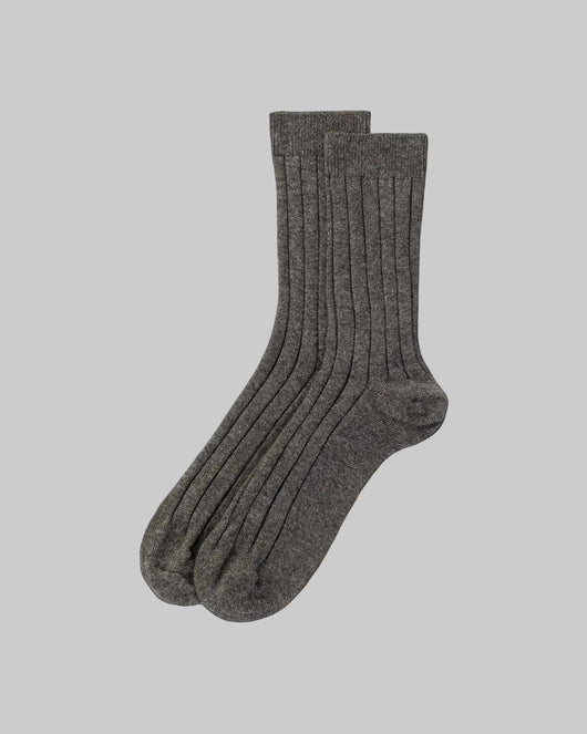 Pair of dark gray socks on a white background